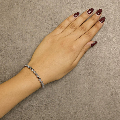 .925 Sterling Silver 1/4 Cttw Diamond 7" Open Circle Wheel Link Tennis Bracelet (I-J Color, I2-I3 Clarity)