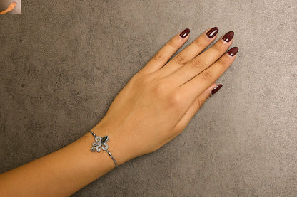 .925 Sterling Silver Marquise Black Onyx, Orange Citrine, and Diamond Accent Lariat 4”-10” Fleur De Lis Adjustable Bolo Bracelet (I-J Color, I1-I2 Clarity) - 7"